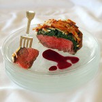 Potato Crusted Filet Mignon with Arugula & Pomegranate Sauce