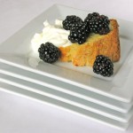 cornmeal cake with berries and cream