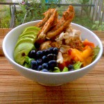 Salad of Frissée with Spatchcocked Chicken, Peaches, Avocado, and Blueberries