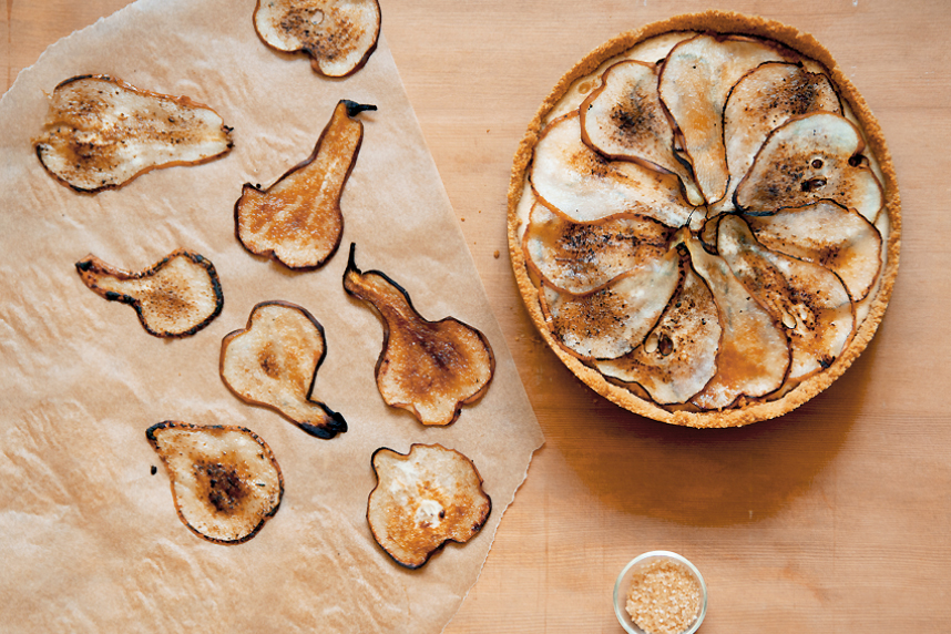 maple cheesecake with thinly sliced charred pears