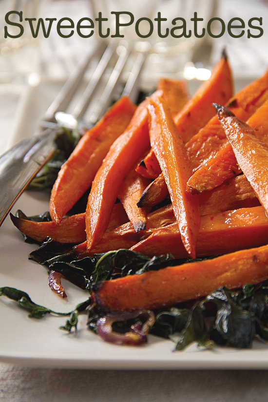 Spicy glazed sweet potatoes on a bed of sweet potato greens