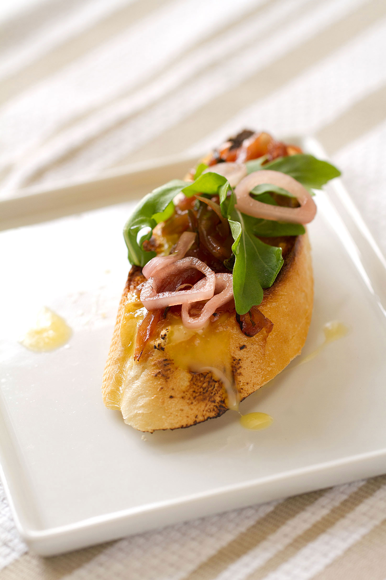 Époisses Toasts with Pickled Shallot and Onion Jam