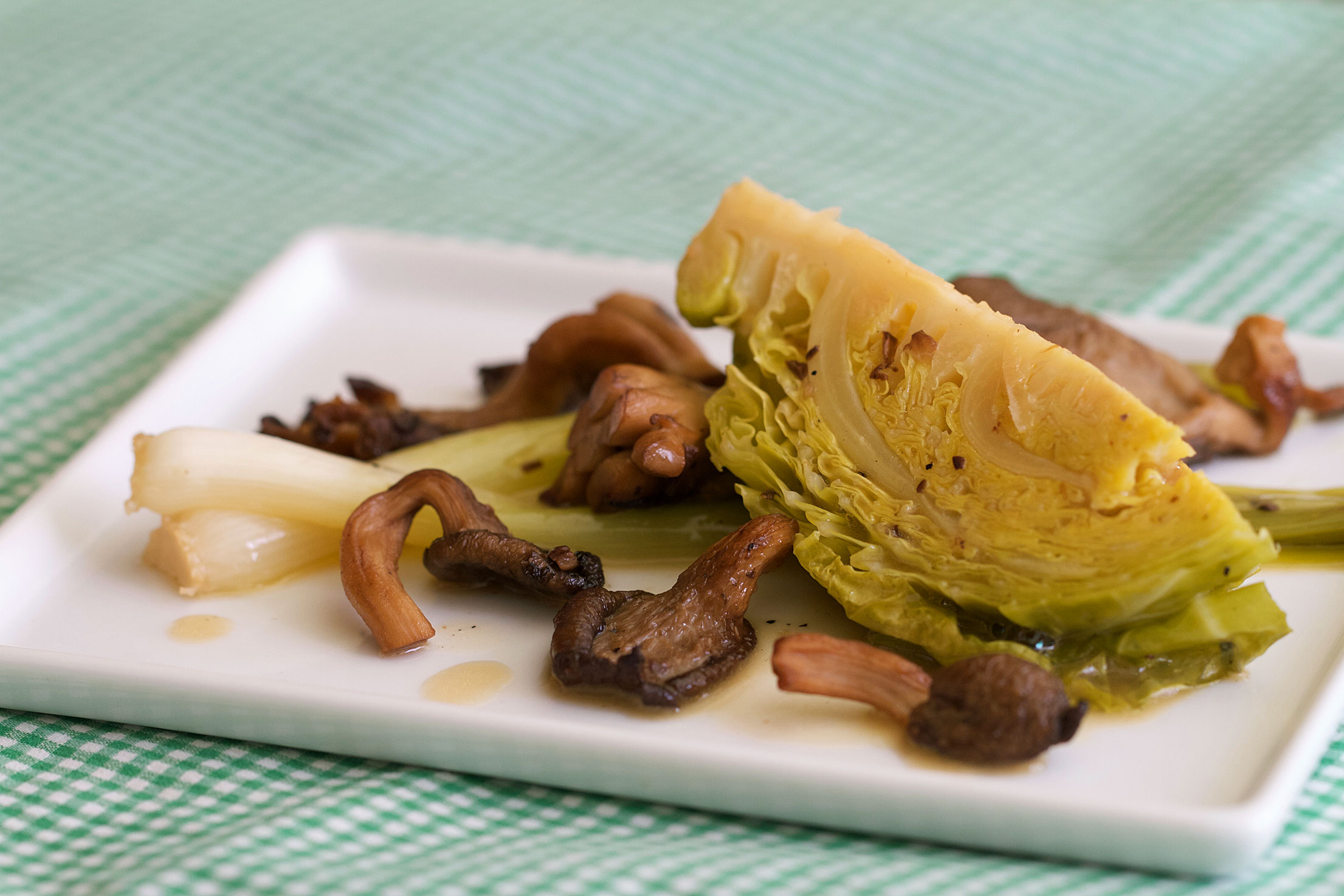 Butter Braised Baby Leeks with Brussels Sprout Crowns and Oyster Mushrooms 