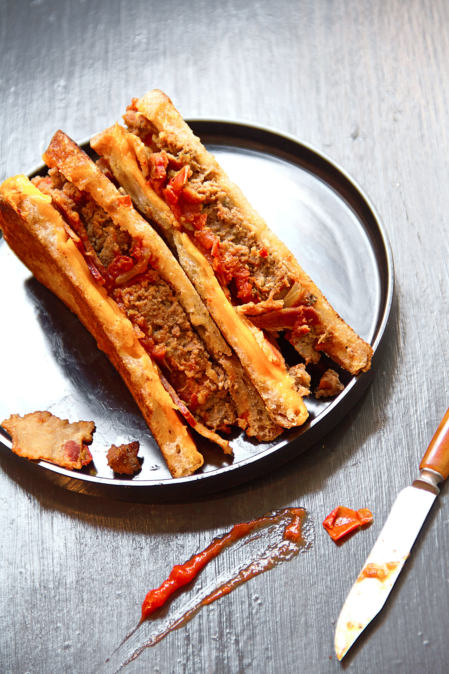 Pan Grilled Meatloaf Sandwich with Cheddar, Bacon, and Curry-Tomato Relish