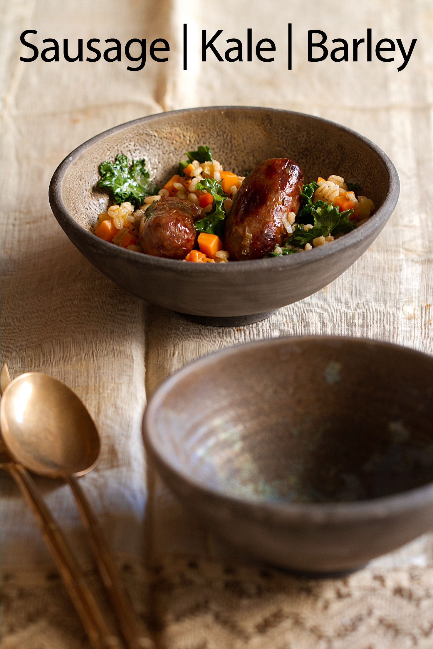 Italian Sausages Cooked in the Oven and Served in a Stew with Kale and BarleyItalian Sausages Cooked in the Oven and Served in a Stew with Kale and Barley