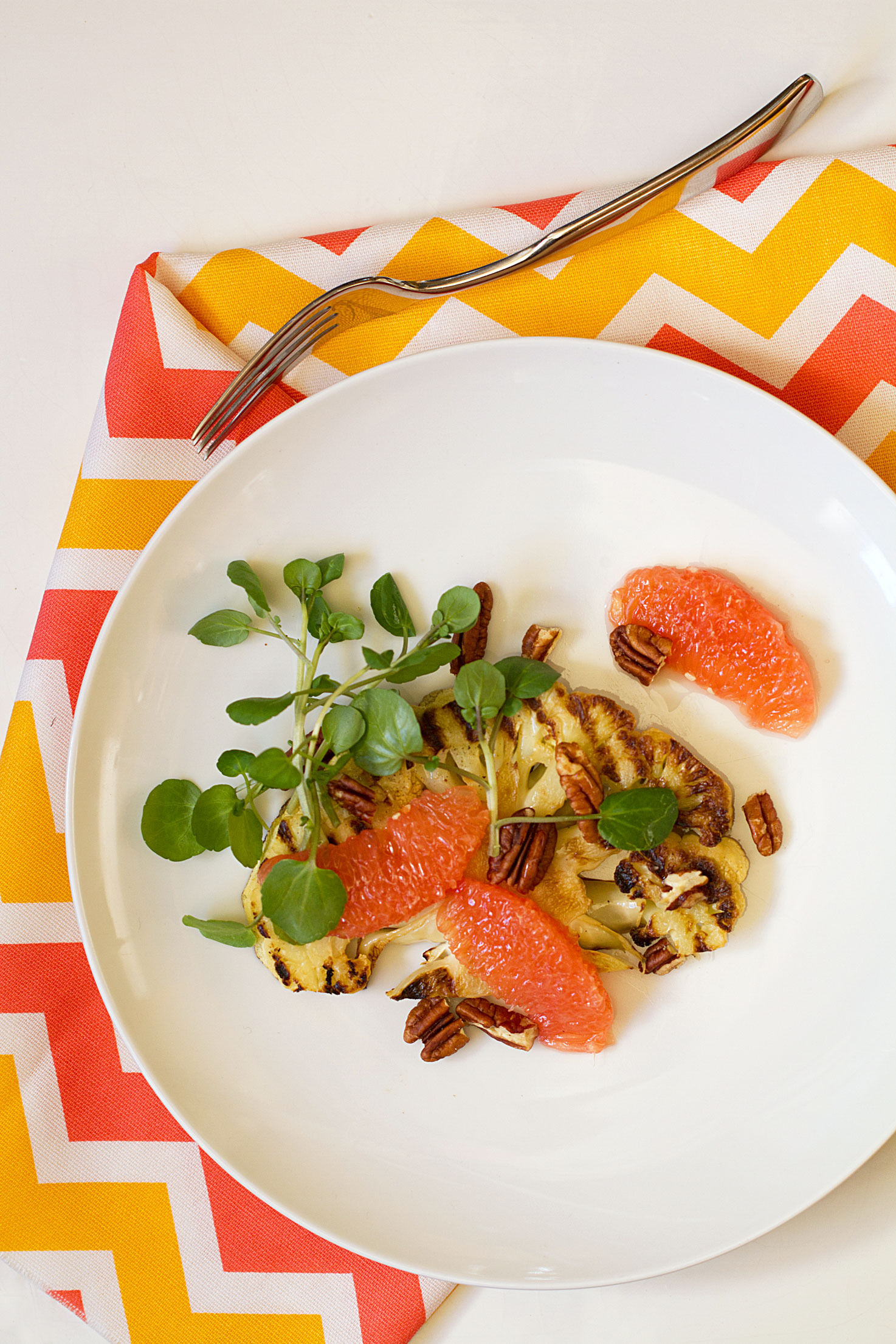 Grilled Cauliflower Steaks with Grapefruit, Watercress, and Pecans