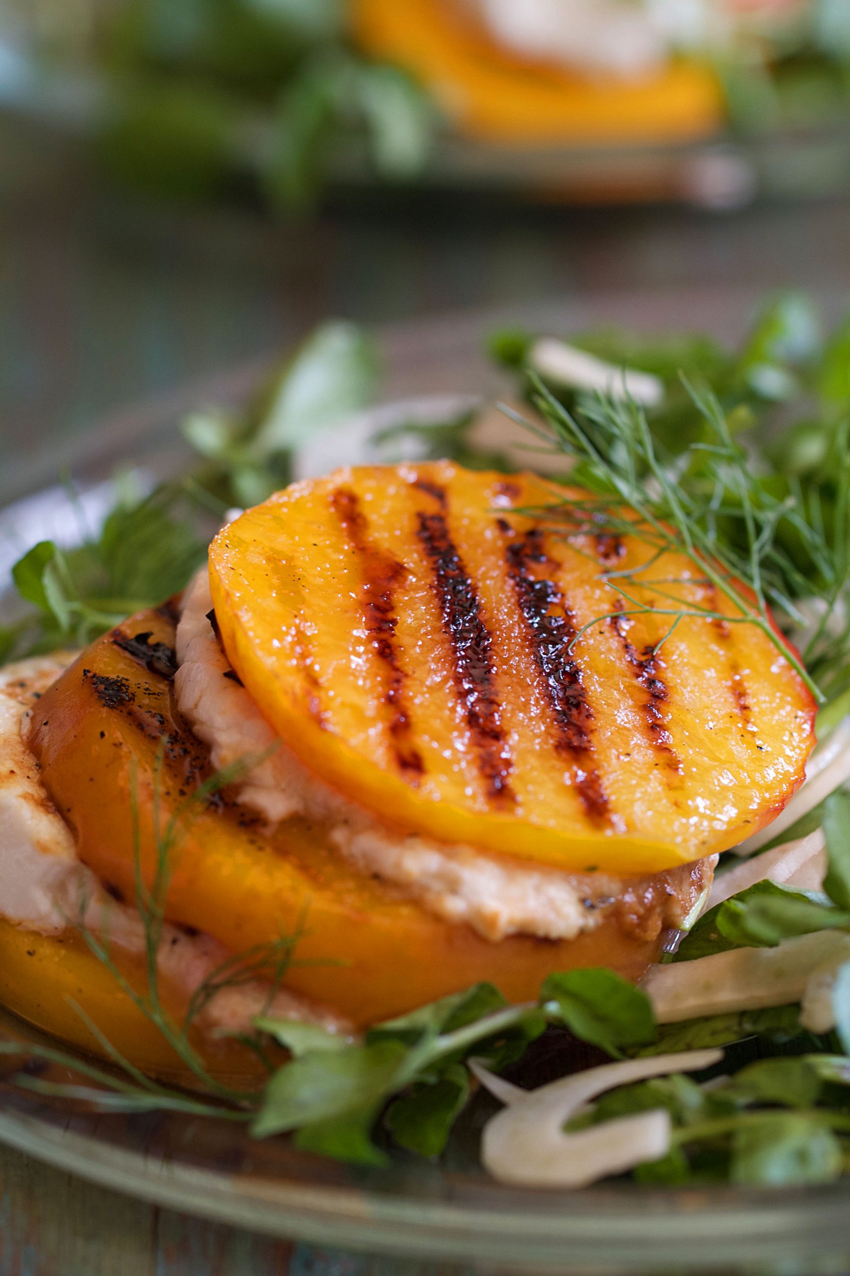 Grilled peaches with fennel and goat cheese