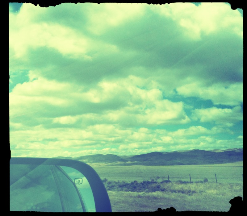 clouds out a car window