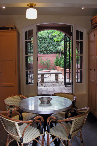 Doors to the courtyard in SippitySups kitchen.