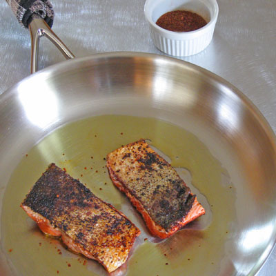 seared salmon in a pan