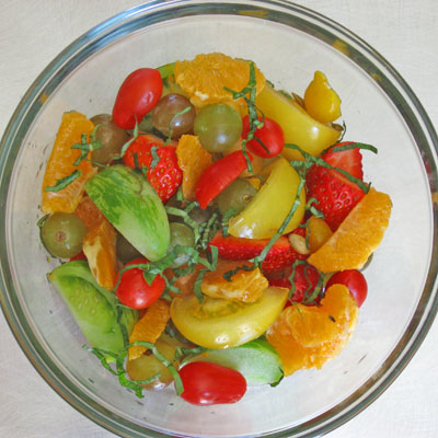 marinating fruit and tomato salad