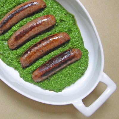 grilled sausages with arugula pesto